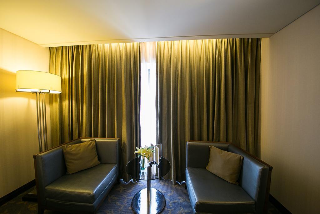 Evergreen Plaza Hotel - Тайнан Стая снимка A room at the hotel